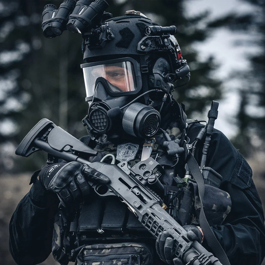 Military personnel wearing a gas mask with High-performance CBRN gas mask filter