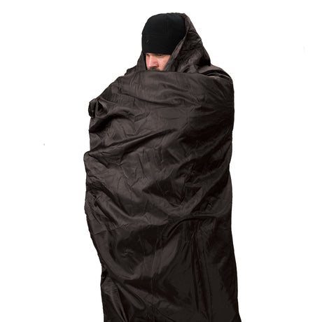 Snugpak Jungle Blanket wrapped around man