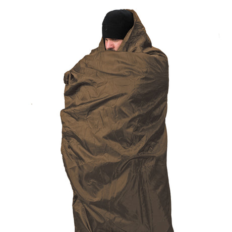 Snugpak Jungle Blanket fully spread out on grass
