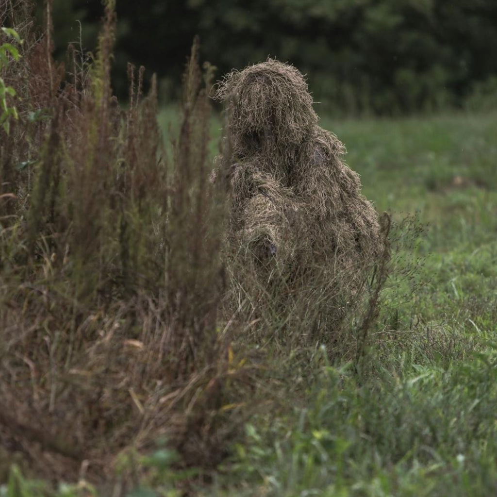 Full view of suit worn in open grassland environment