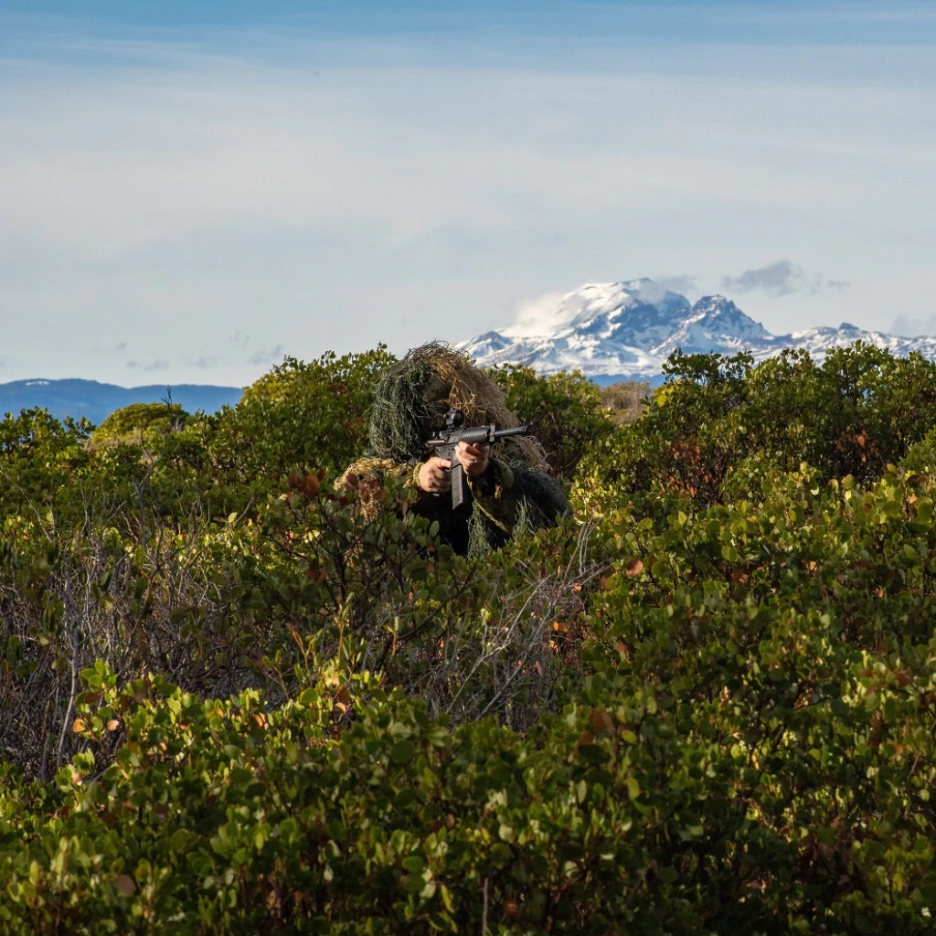 Woodland camouflage Warrior Ghillie in the bush