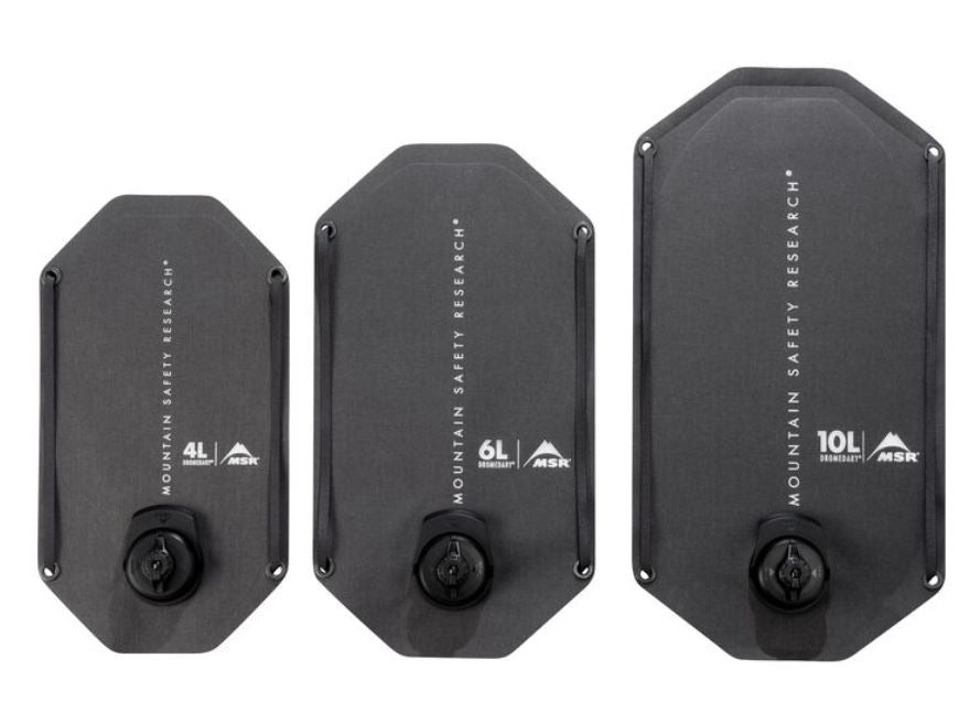 The 2, 4 and 10 L MSR Rugged Water Storage bags. The bags are in a matte charcoal colour with the text 'Mountain Safety Research' along the middle of each bag.
