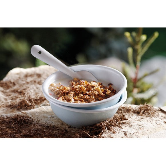A bowl of Happy Yak Apple Cinnamon Freeze dried food with milk in a camping bowl with foon.