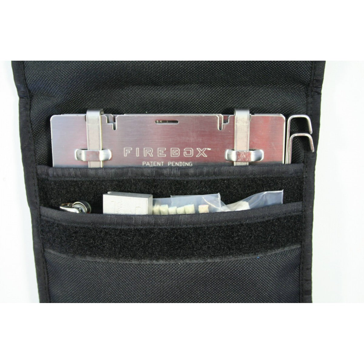 Firebox 5 inch Case with two storage compartments, 1 for the firebox stove and another for firestarting accessories like lighters, fire starting bricks, and firestarting threads.